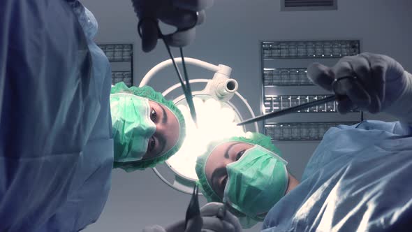 Women Performing Surgery In Hospital Together