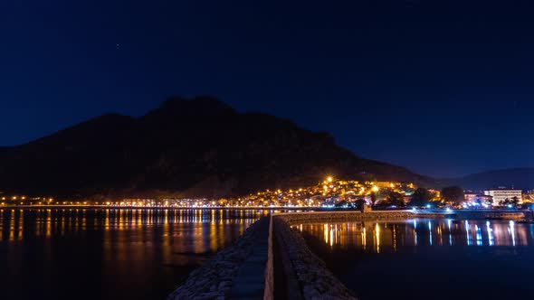 Night Landscape of Egirdir Lake and Coastline Illuminated By Street Lanterns and Lights of Driving
