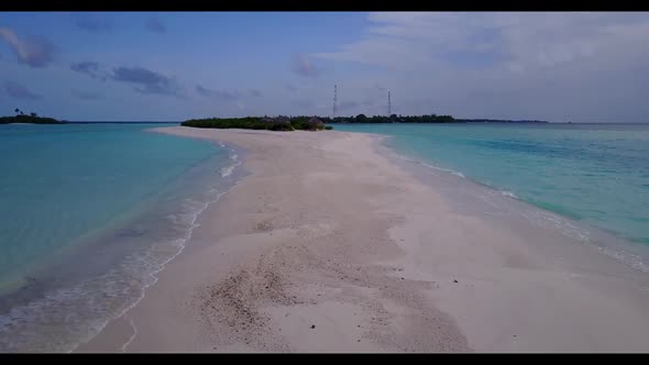 Aerial scenery of marine sea view beach wildlife by blue ocean and bright sandy background of a picn