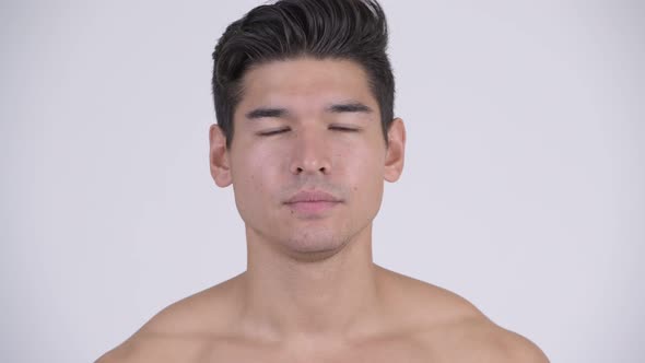 Face of Young Handsome Muscular Shirtless Man