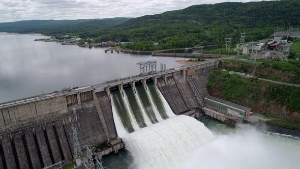 Aerial View of Water Discharge at Hydroelectric Power Plant of Krasnoyarsk City Siberia Russia