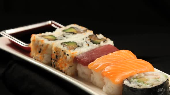 Sushis rotating close up in studio