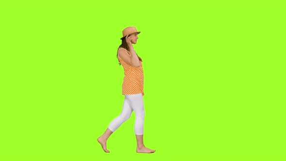 Happy Young Female Walking Barefoot on Green Background, Chroma Key