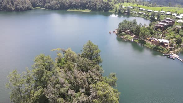 Aerial view of lake side with park and mountain in Bandung, Indonesia