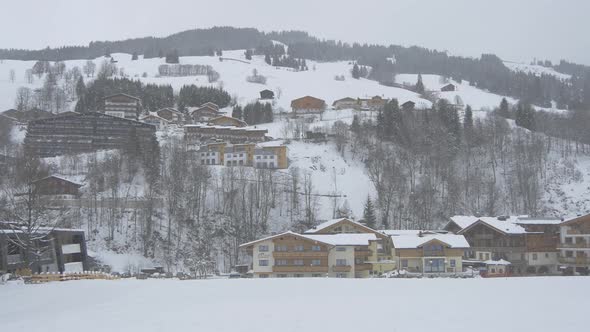 Panoramic view of chalets during snowfall