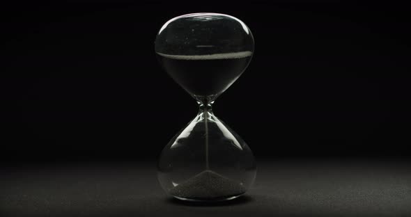 Hourglass with black sand