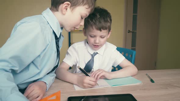 Tracking Slow Motion Pupils Do Homework Write Numbers in Notebooks Help Each Other 2