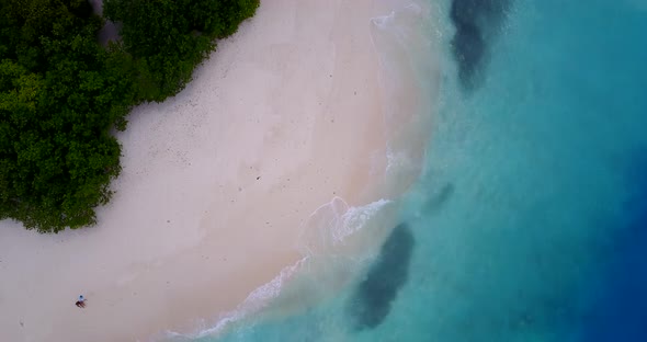 Luxury drone clean view of a paradise sunny white sand beach and aqua blue ocean background in hi re