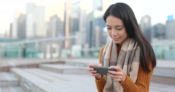 Woman Taking Photo on Cellphone at Outdoor