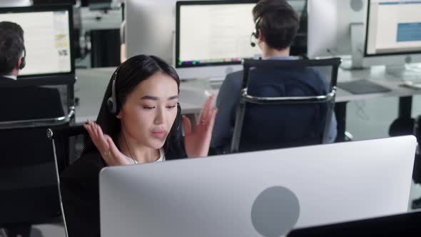 Close Up Portrait of Woman a Technical Customer Support Specialist Talking on a Headset While