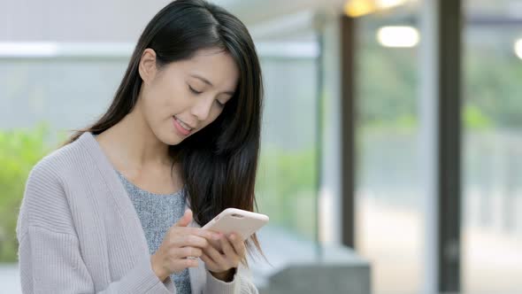 Young Woman use of mobile phone