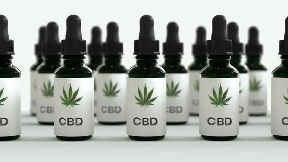 Seamless Loop of A lot of CBD oil bottles with marijuana or cannabis oil leafs in between. White bra