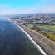 Aerial view of Pacifica Esplanade Beach and Sharp Park Golf Course with Milagra Ridge mountain range - VideoHive Item for Sale