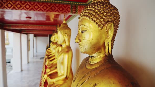 Close Up Gold Leaf Buddha Statues in Bangkok, Thailand at Buddhist Temple, Buddhist Statues Portrait