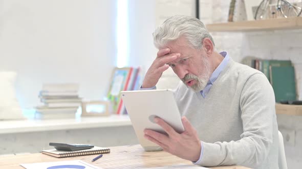 Old Man Upset By Loss of Online Trade on Tablet