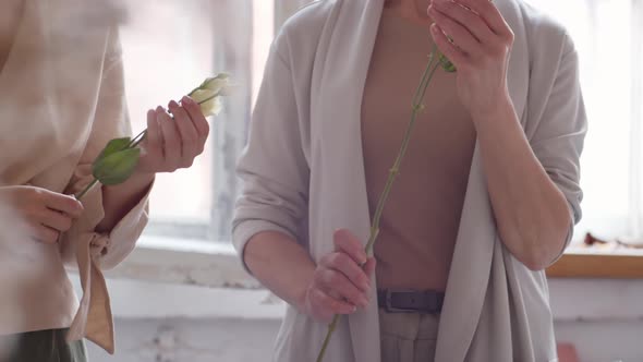 Two Women Talking in Flower Shop