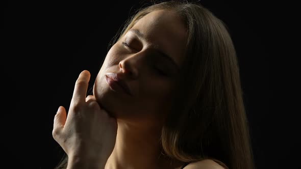 Attractive Female Touching Chin, Enjoying Perfect Skin After Plastic Surgery