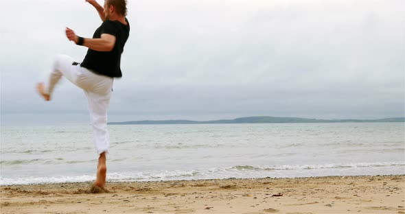 Fit Man Practicing Martial Arts