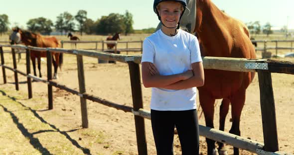 Portrait of girl standing with arms crossed in ranch 4k