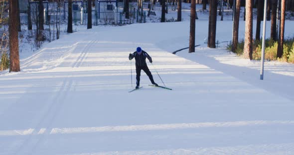 Nordic Sportsman Training at Ski Run at Wintertime