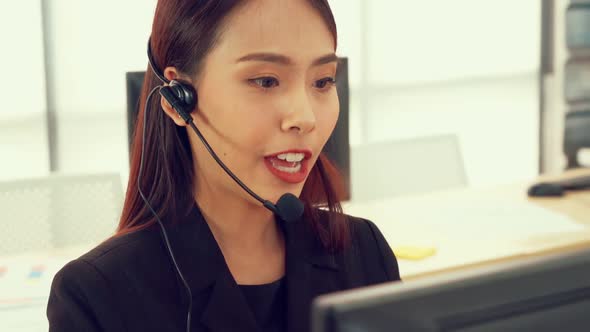 Business People Wearing Headset Working in Office