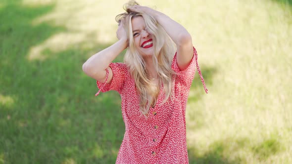 Stylish Female Making Face in Park