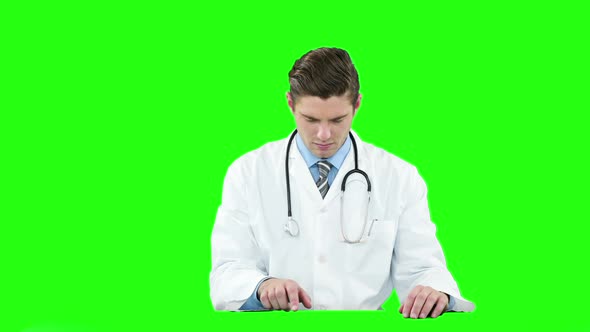 Male doctor using digital screen