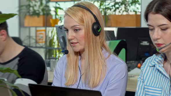 Charming Young Woman Smiling To the Camera, Working at Call Center