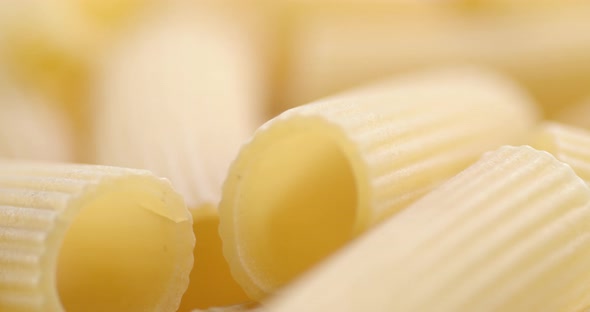 Dry Pasta Cannelloni on Table Slowly Rotates. 