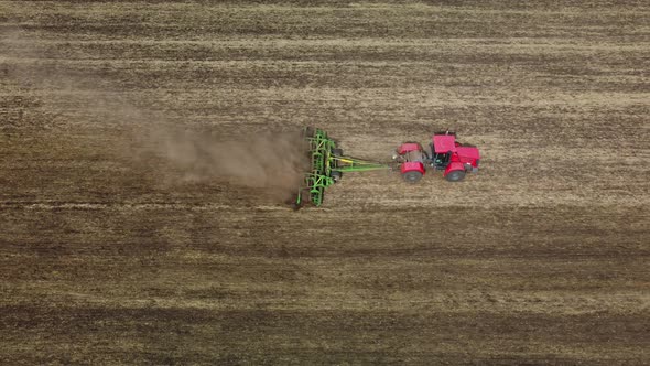 Cultivation of Soil By Tractor View From a Height