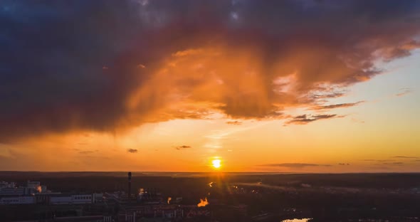 Beautiful Sunset Over the Industrial Area in the City