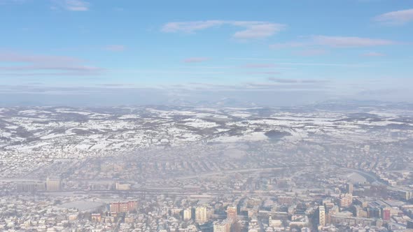Polluted air over the valley by winter 4K drone video