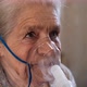 The Procedure of Inhalation with a Nebulizer for Older Women. - VideoHive Item for Sale