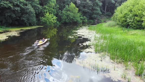 Aerial Drone View of Sport Canoe on Summer Calm Forest River alt