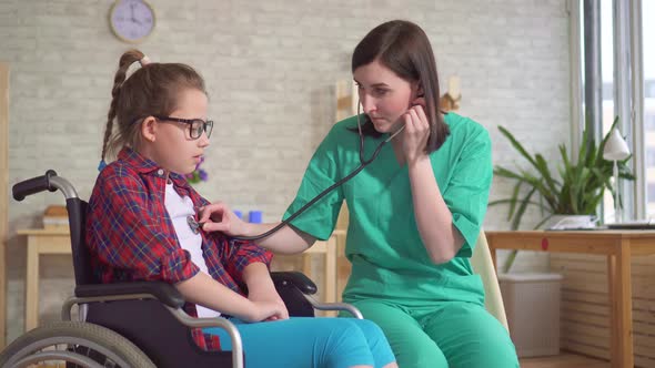 Therapist and the Child in the Wheelchair the Use of a Stethoscope