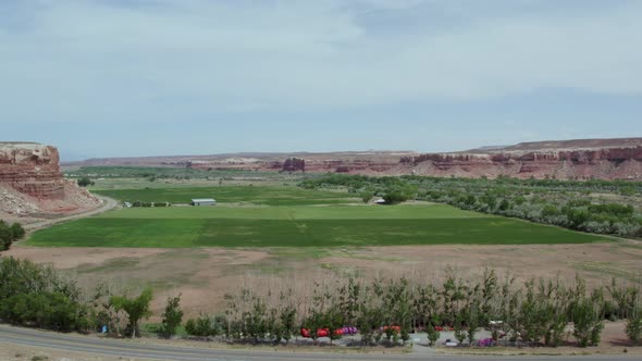 Green Farmland during Drought in Southwest Desert Town of Bluff, Utah - Aerial