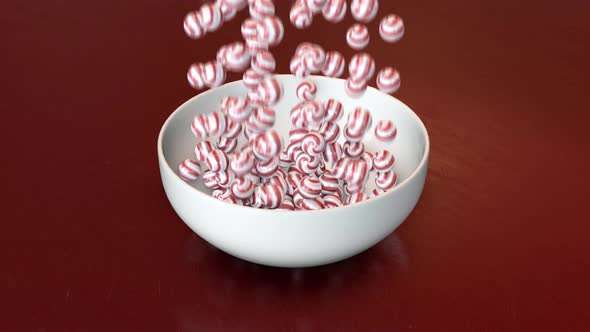 candies falling on the plate