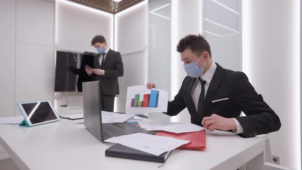 Professional Persuasive Caucasian Man Conferencing Online From Office on Coronavirus Pandemic