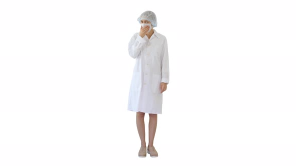 Coughing Female Doctor in a Mask To Prevent Others From Infection on White Background.