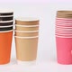 stack of disposable paper cups for coffee and tea on a white background - VideoHive Item for Sale