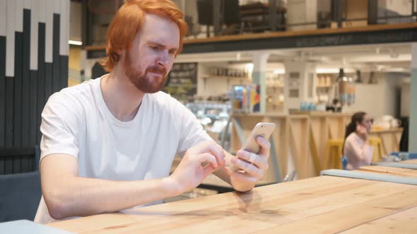 Smartphone, Beard Man Upset by Loss of Work