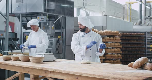 Good Looking Baker and His Chef Enjoying the Work