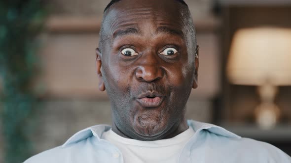 Close Up Surprised Male Portrait Amazed Face American African Adult Man 60s Senior Businessman