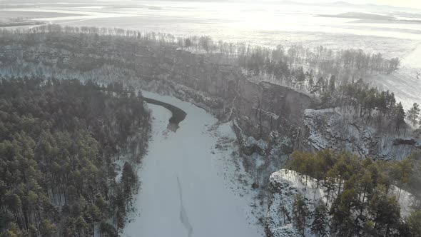 Aerial View of Mountain Cliff and River