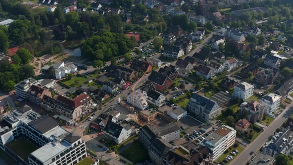 High Aerial View of Residential Area Houses in Scharbeutz Germany Forward Tilt Up Reveal Amazing