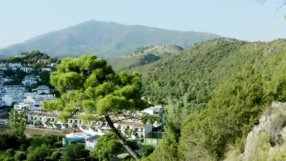 Revealing shot of mountain village  in west of costa del sol - Benahavis