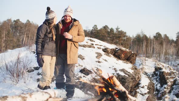 Warming Up near Campfire  alt