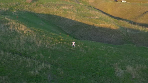 Woman Practicing Yoga in Nature alt