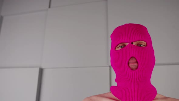 Portrait of Unrecognizable Man in Pink Balaclava