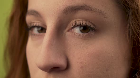 Closeup portrait of woman eyes looking to camera